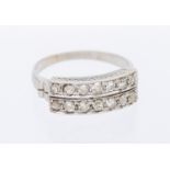 A diamond set 18ct white gold ring, comprising two rows of grain set old cut diamonds, total diamond
