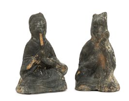 Two Chinese funeral terracotta figures, probably late Ming, modelled as seated Deities, approx