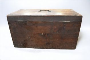 A 19th Century small pine chest with instils and brass swing carry handle along with a mid 20th