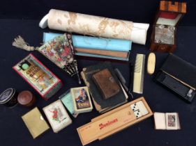 A mixed collectors lot containing Edwardian playing cards, dominos, treen boxes, fans, vintage