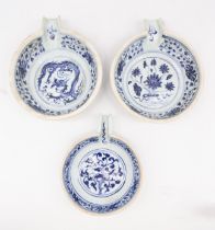 Three Chinese blue and white pouring bowls, in the style of  Yuan Dynasty (1279-1368), each circular