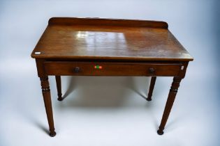 A 19th Century mahogany hall table/ladies desk with single top drawer on four turned legs.