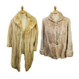 A blond mink coat by P Work in Jura, this full length coat had a cowl collar and hook fastening (