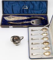 A 20th century cased set of six 800 silver teaspoons, each marked 39PA, 800, St, with shell