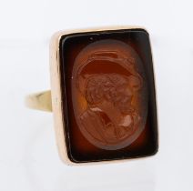 A large carved agate intaglio and 9ct yellow and rose gold ring, comprising a rectangular agate