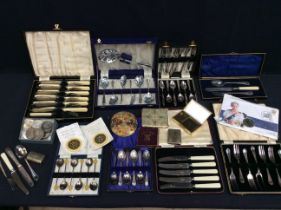 A mixed lot to include; various silver plated flat wares, some cased, some uncased, fish forks and