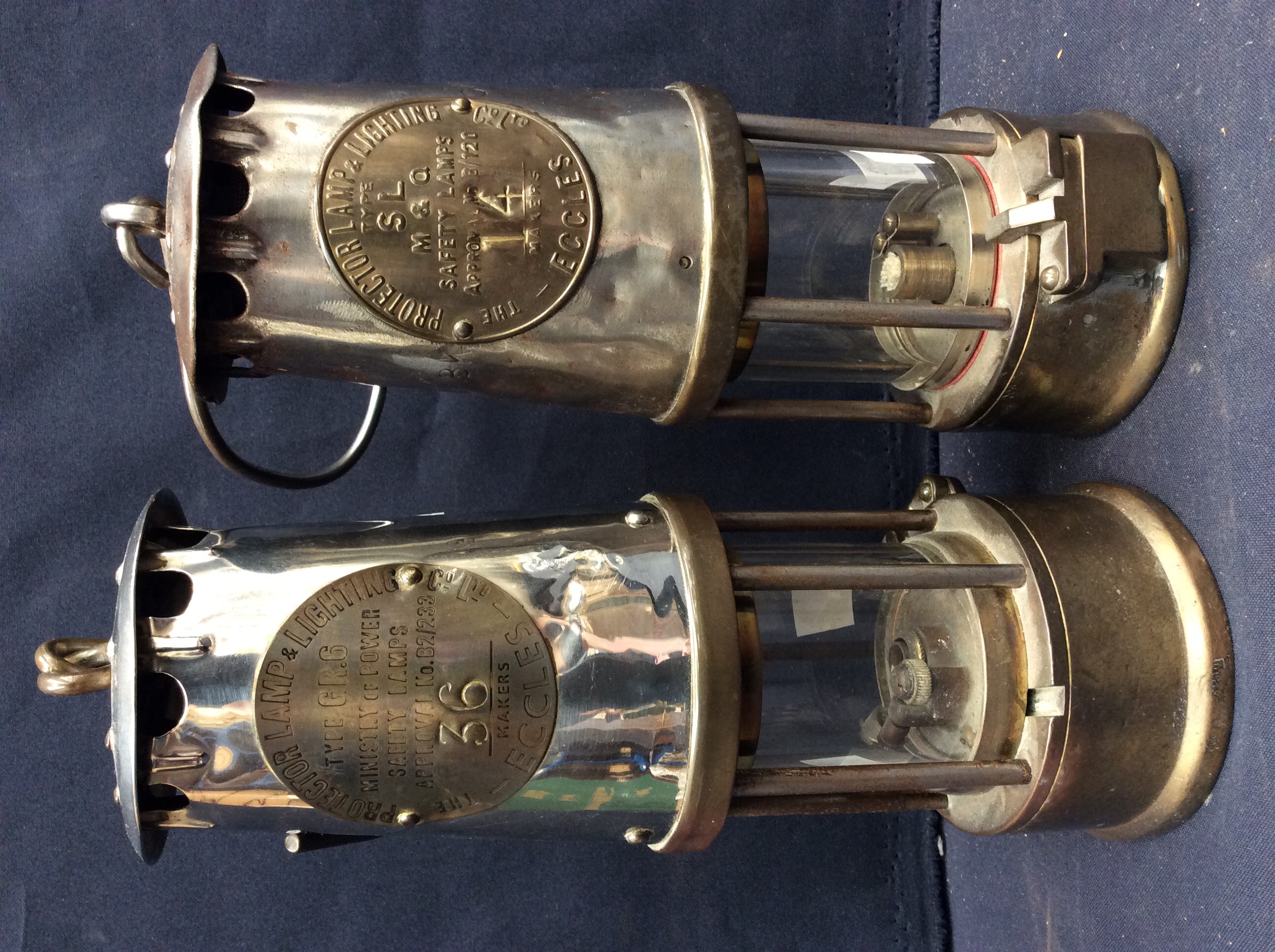 Two Eccles miners lamps, both with plaques. (2)