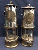 Two Eccles miners lamps, both with plaques. (2)