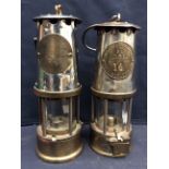 Two Eccles miners lamps, both with plaques. (2)