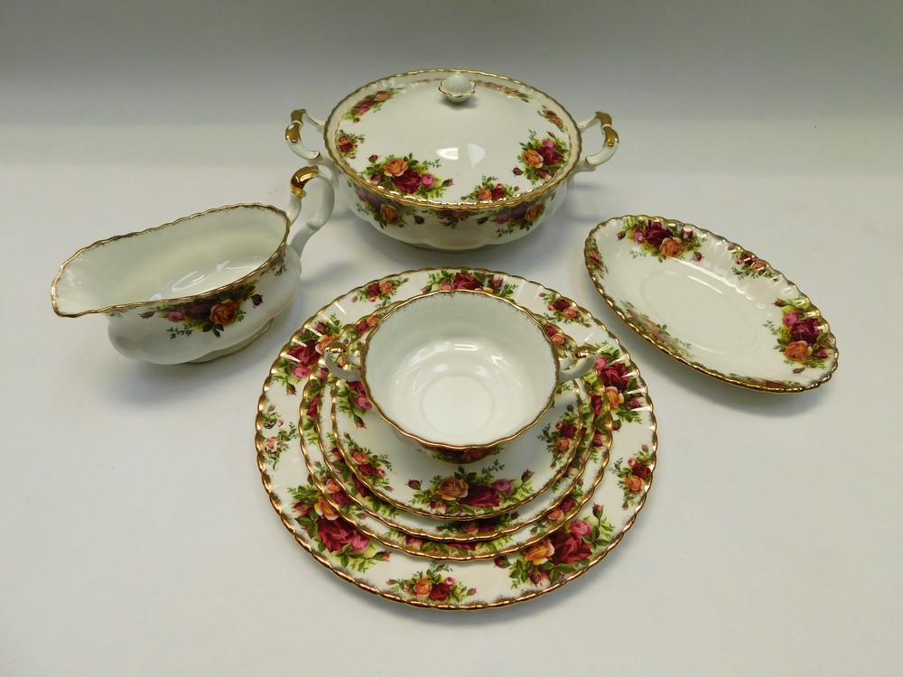 A collection of Royal Albert and Old Country Rose dinner and part tea service including tureens,