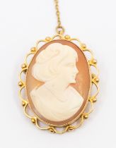 A 9ct gold mounted cameo brooch, within a fancy scroll and bead border, size 28x 22mm, later base