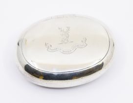 A George VI oval silver snuff box, with engraved stags head crest to hinged cover, hallmarked by D