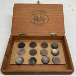 A set of 12 black lip oyster buttons with note to verso stating they belonged to Queen Victoria,