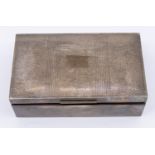 A Queen Elizabeth II rectangular silver cigarette box, engine turned decoration, two compartment