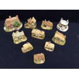 A collection of Lilliput Lane unboxed figures.