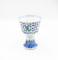 A Doucai decorated Stem decorated with stylised leaves, underglaze blue six Character Yongzheng mark