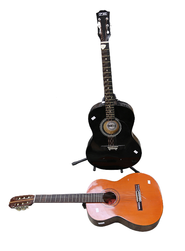 An acoustic 3rd Avenue black gloss guitar on stand with case along with a Rolif guitar.