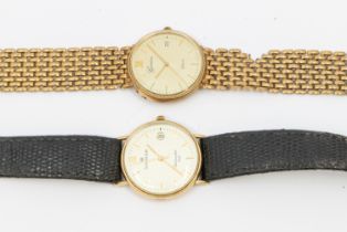 A gents 9ct gold gold Geneve wristwatch, with round champagne dial, gilt markers, date aperture at