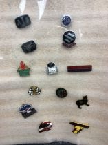 A collection of vintage motorcycle and lorry pin badges and lapel pins to include: Albion, Commer,