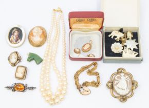 A collection of costume jewellery to include a cameo pendant set in 9ct gold along with a similar