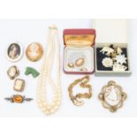 A collection of costume jewellery to include a cameo pendant set in 9ct gold along with a similar