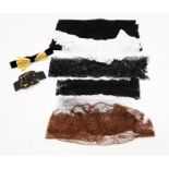 A small collection, including: black tulle/lace with a sequin decoration; a piece of black Chantilly