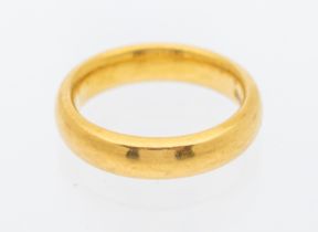 A 22ct  gold gentleman's wedding band, width approx 4mm, size K1/2, weight approx 8.3gms  Further