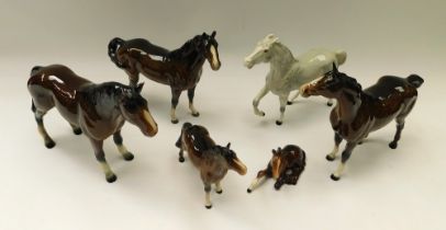 A collection of six John Beswick china horses, one of which is dapple grey, 2 chipped to ears, 1