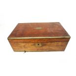 A 19th Century mahogany writing box with brass supports.