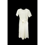 A slub taffeta ivory wedding dress, 1938, the dress has a square neckline (discoloured around the