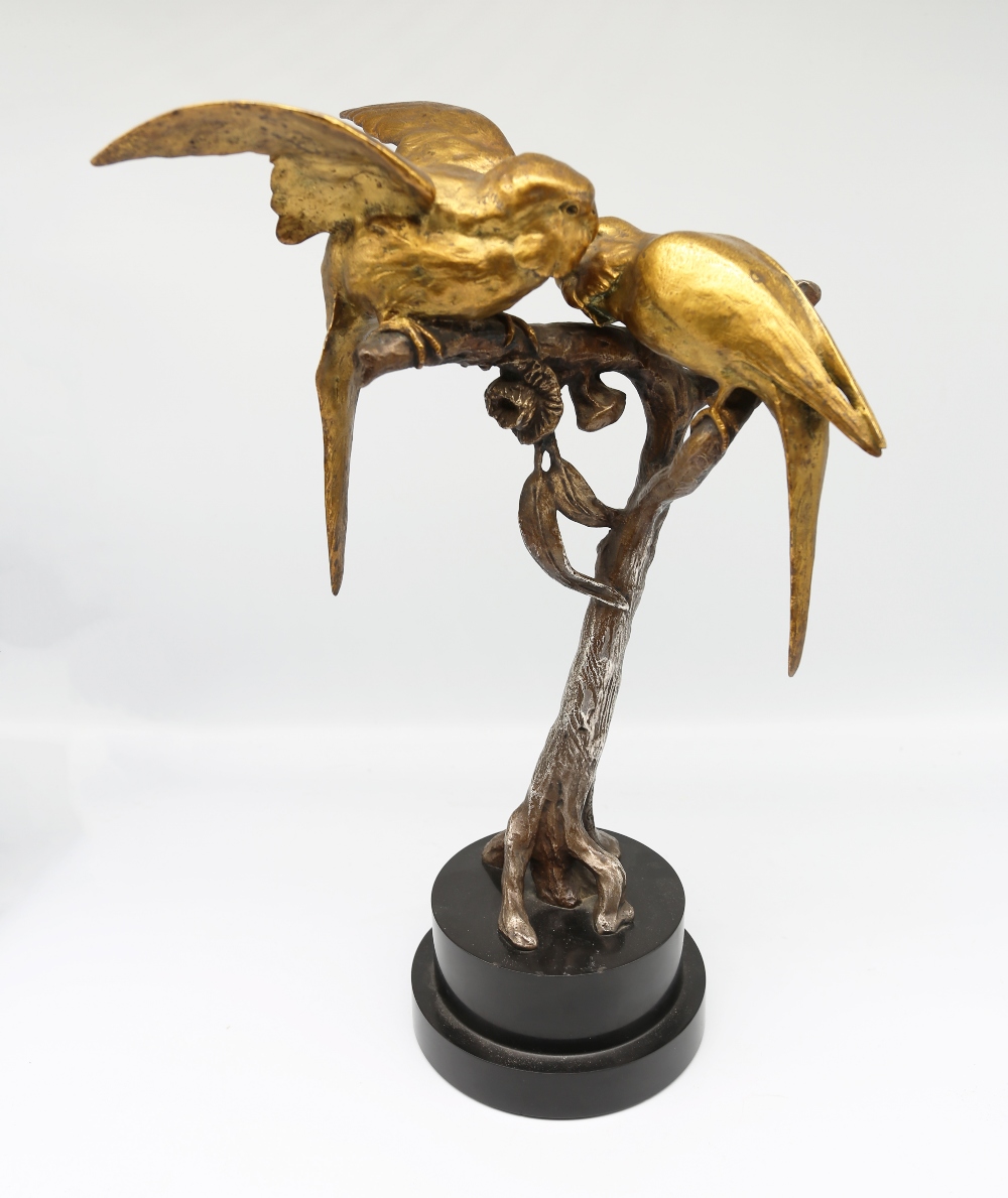 A French 20th century gilded bronze model of Love Birds signed R Durquet on polished stone plinth.