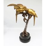 A French 20th century gilded bronze model of Love Birds signed R Durquet on polished stone plinth.