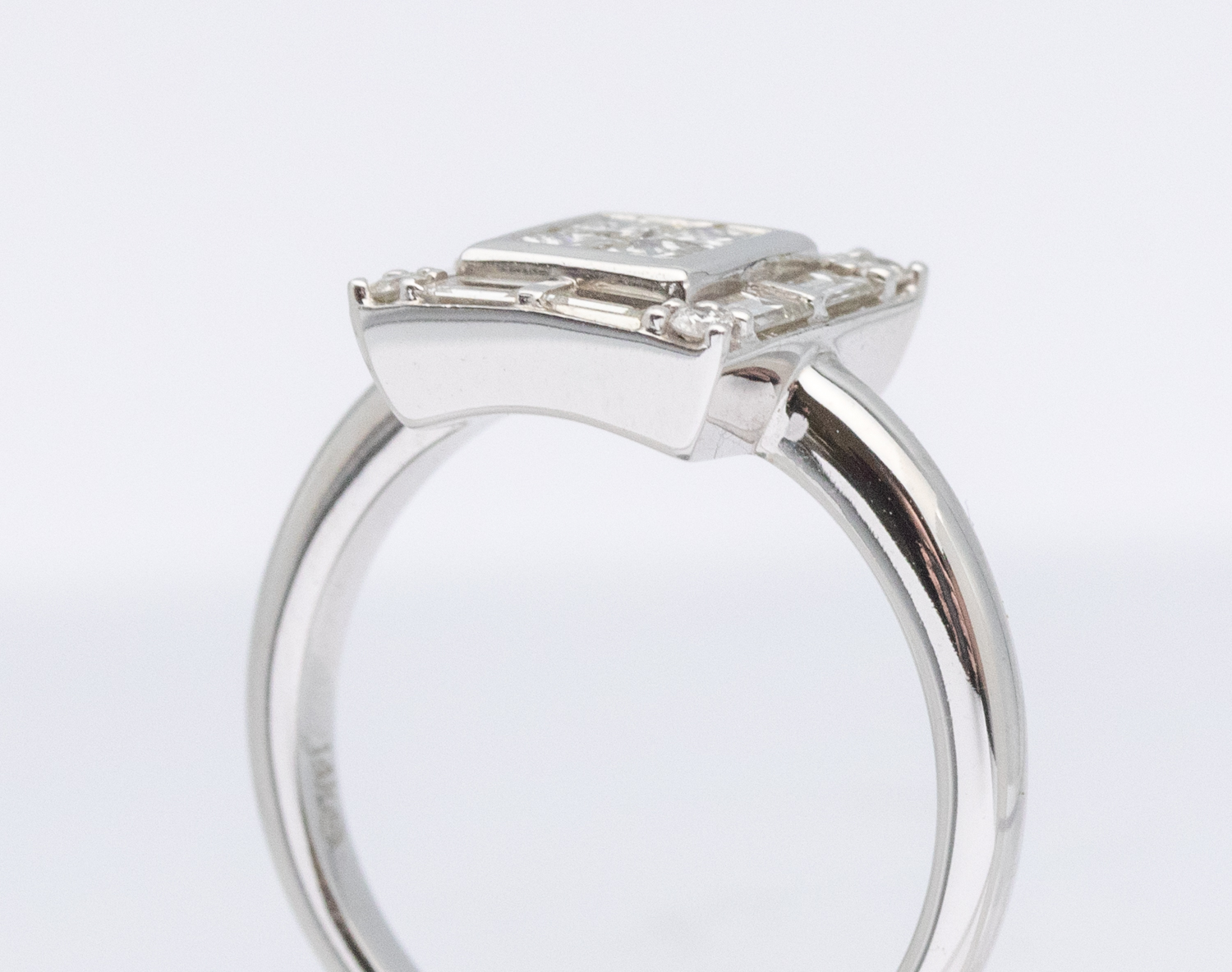 A diamond set 14ct white gold ring, comprising a square mount illusion set to the centre with four - Image 2 of 4