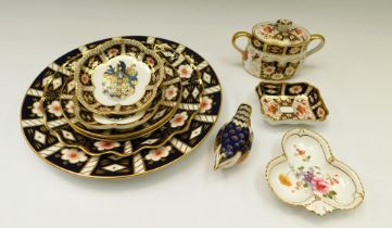 A Royal Crown Derby Wren Paperweight with a ceramic stopper and 2 Limited edition Armorial Dishes in