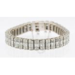 A diamond and 18ct white gold line bracelet with an estimated diamond weight approx 19.45 carats,