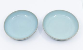 A pair of Modern Jun-ware saucer dishes, blue crackle glazed, on rim feet, approx 13cm diam (2)