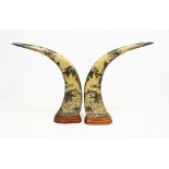 A pair of mid 20th Century Chinese carved cattle horns.