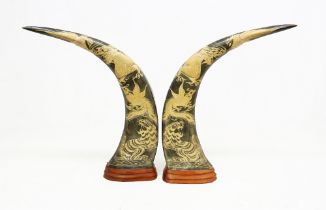 A pair of mid 20th Century Chinese carved cattle horns.