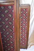 A late Victorian mahogany four panelled room screen with fabric centres along with a mid Victorian