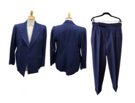 A navy pin striped 1940s de-mob suit, wide lapels, double breasted, turned up trousers.