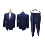 A navy pin striped 1940s de-mob suit, wide lapels, double breasted, turned up trousers.