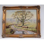 A 20th Century oil on canvas by James D Preston of a country scene along with an oil on board by