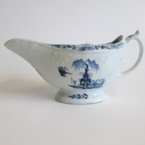 A Lowestoft moulded sauce boat, chinoiserie scenes Circa 1760 Length 20cm Condition; hairline