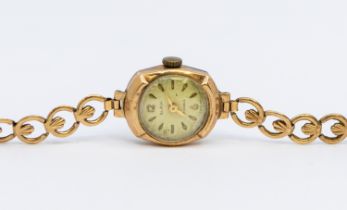 A ladies 9ct gold Slava 17 jewels wristwatch, round dial with baton and arabic number markers,