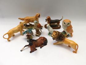 Beswick: a collection of birds and animals to include Royal Doulton examples and a Wade cockatoo. (