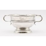 A George VI silver twin handled bowl, of circular form on circular footed base, hallmarked by