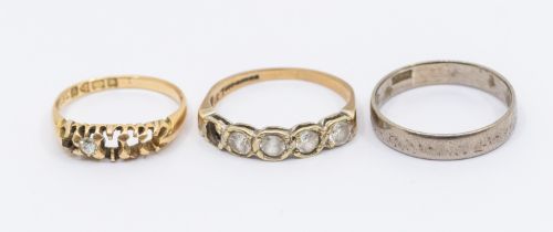 A collection of three gold rings, including a weighable diamond set 18ct gold (stones missing) along