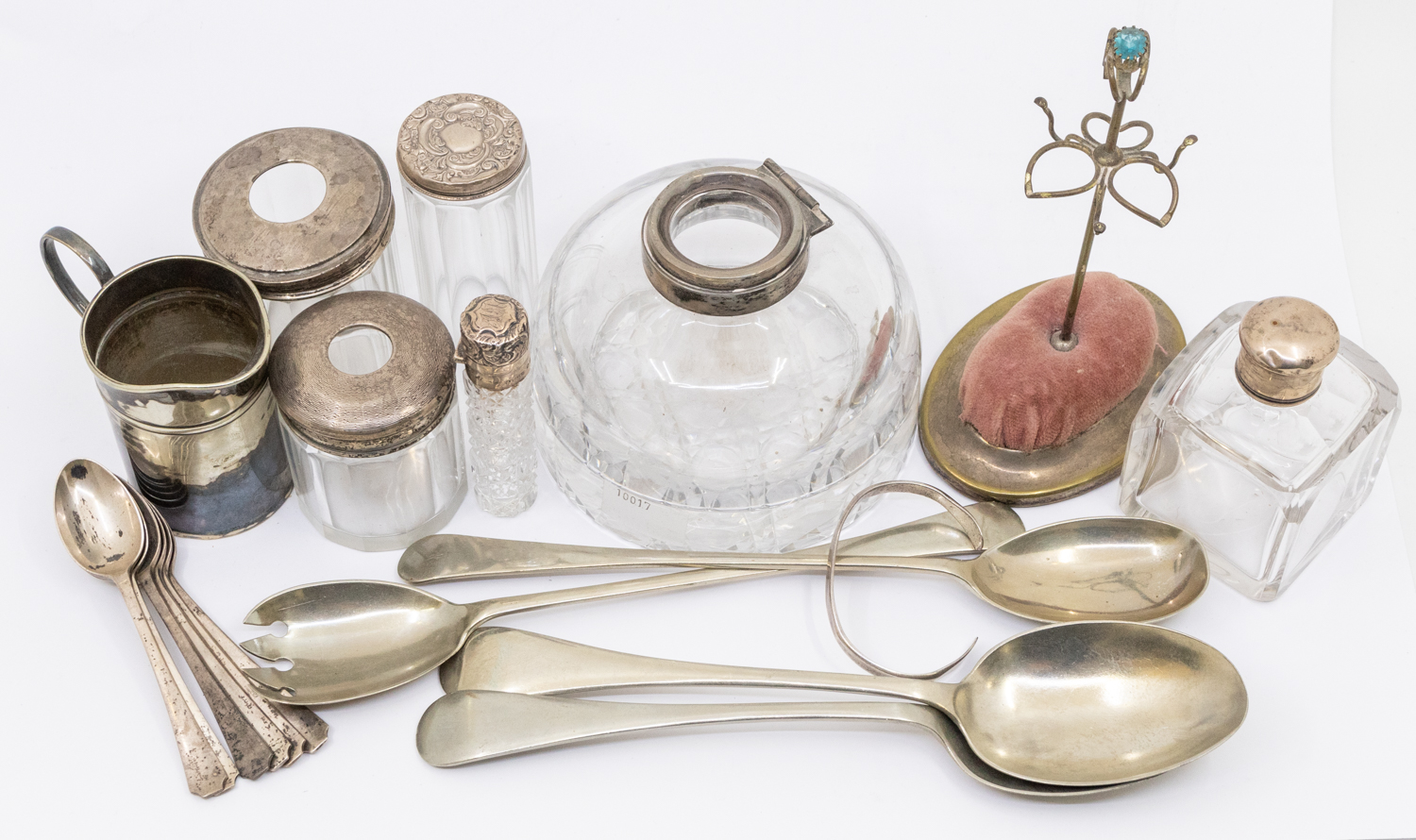 A collection of silver items to include; a set of six George V silver teaspoons, Deco style