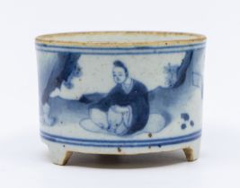 A Ming style small cylindrical bowl on stilt feet, painted in blue, with figures in landscape,