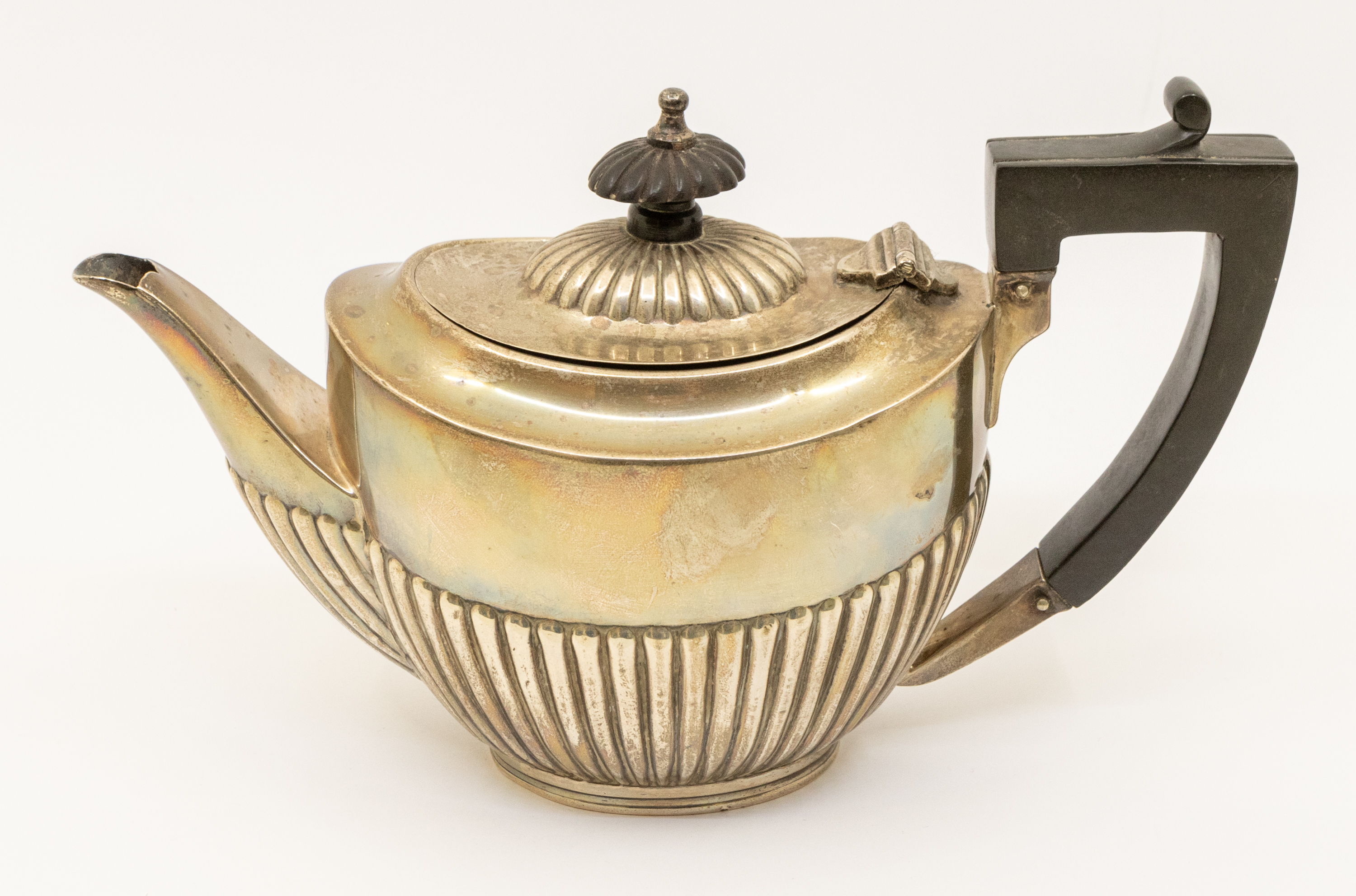 A George V silver bachelor's teapot, gadrooned lower section, ebony handle and finial, hallmarked - Image 2 of 3